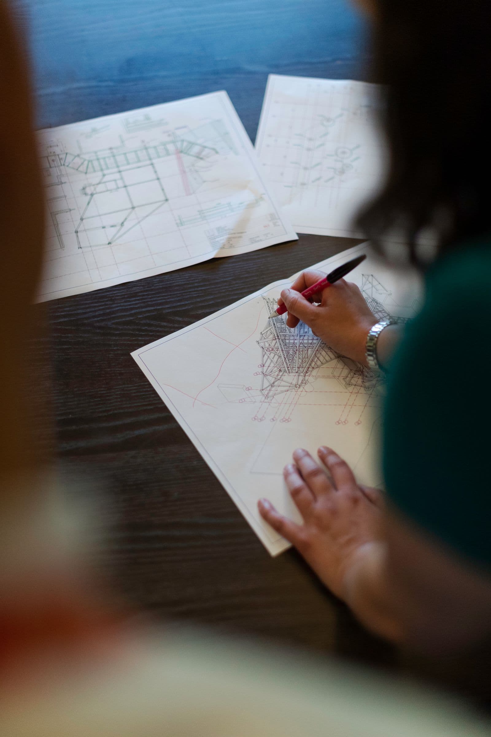 Architect drawing a floor plan by hand