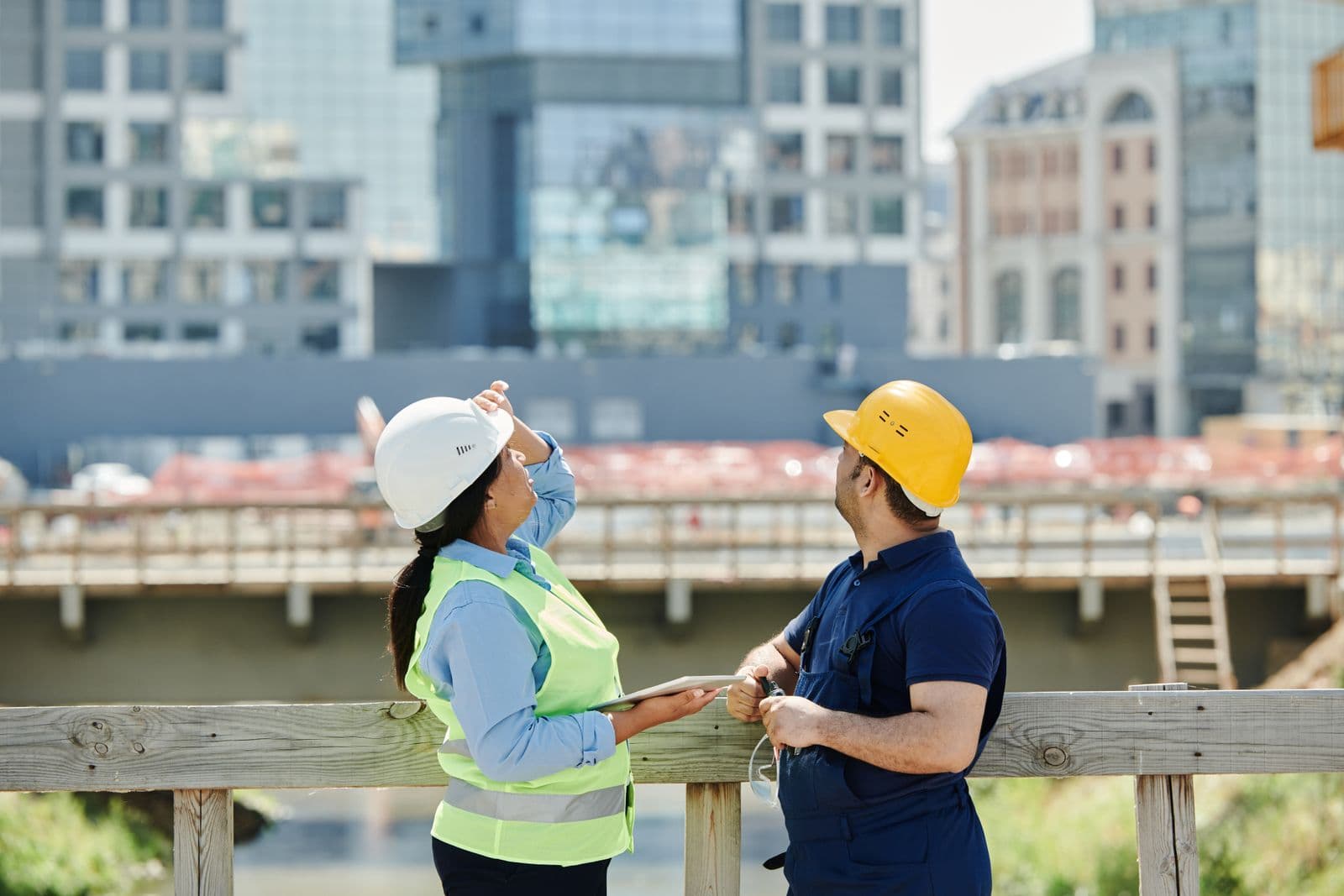 Site meeting between builder and inspector