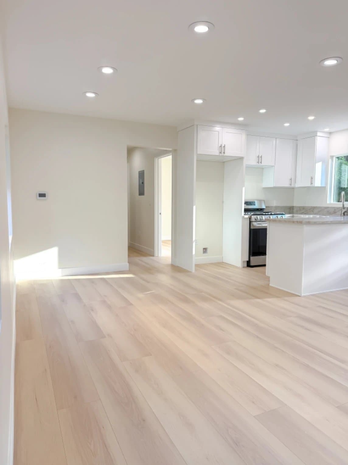 Bright open-plan interior of a finished ADU